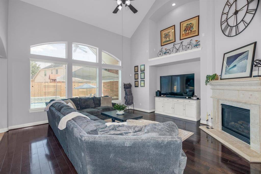 Stone fireplace, arched nooks, "doorways", and windows are just a few of the plentiful architectural details that contribute to giving the home that special feeling.