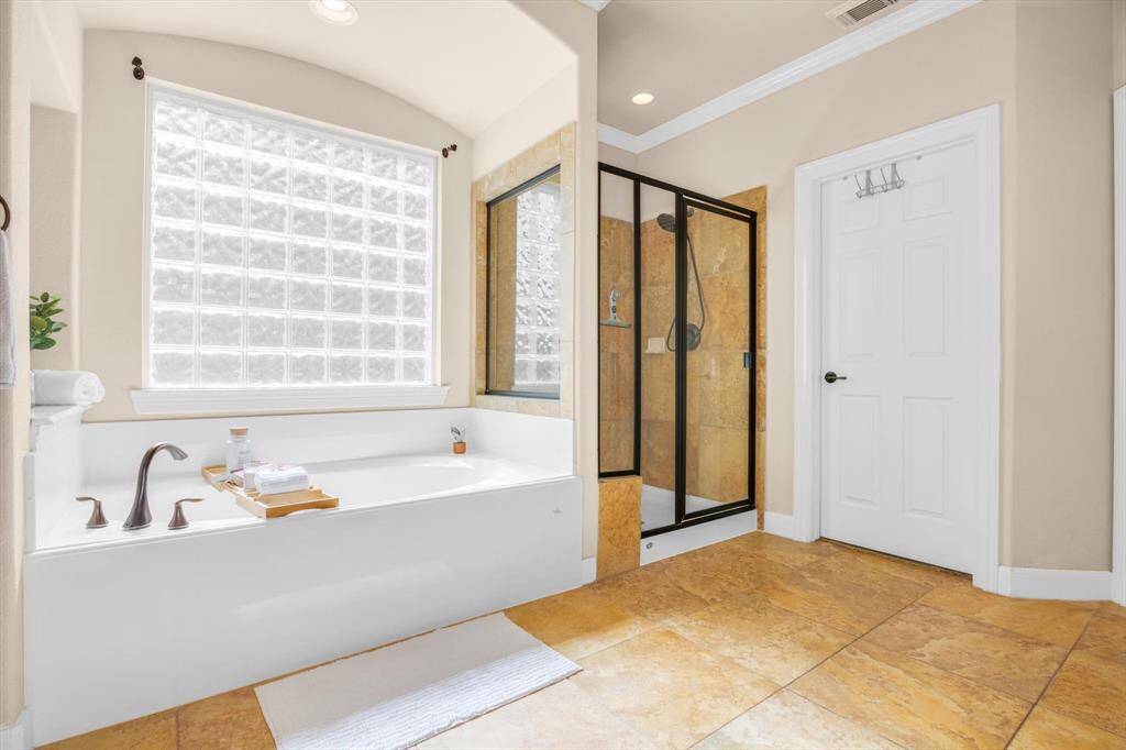 Time for a soak?  The door to the master closet is the door seen in this photo