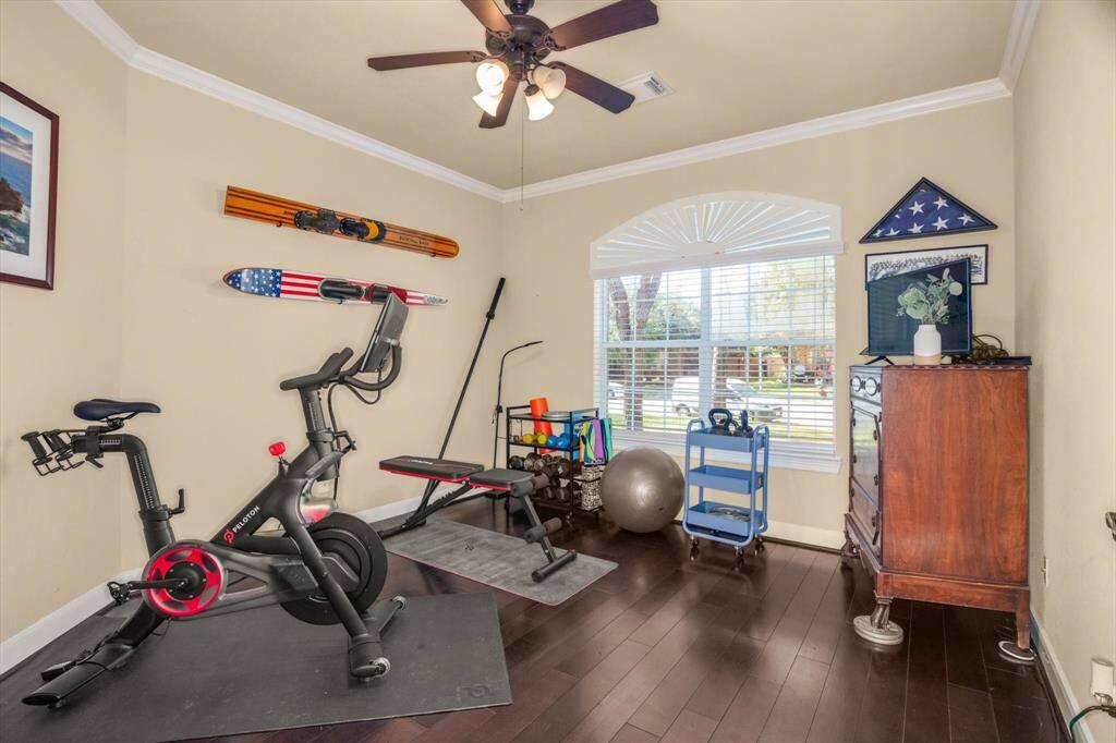 This is the office/study in the front as you came in.  Obviously, it is currently used as a workout room.  Flexible space is always a good thing.