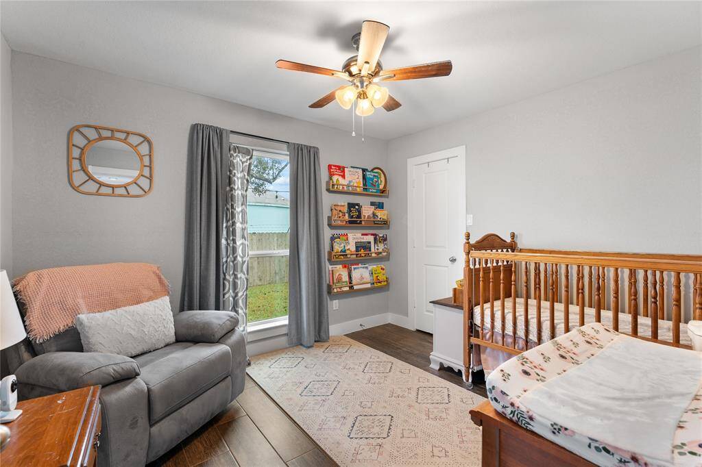 Bedroom #3 with large window and walk in closet.