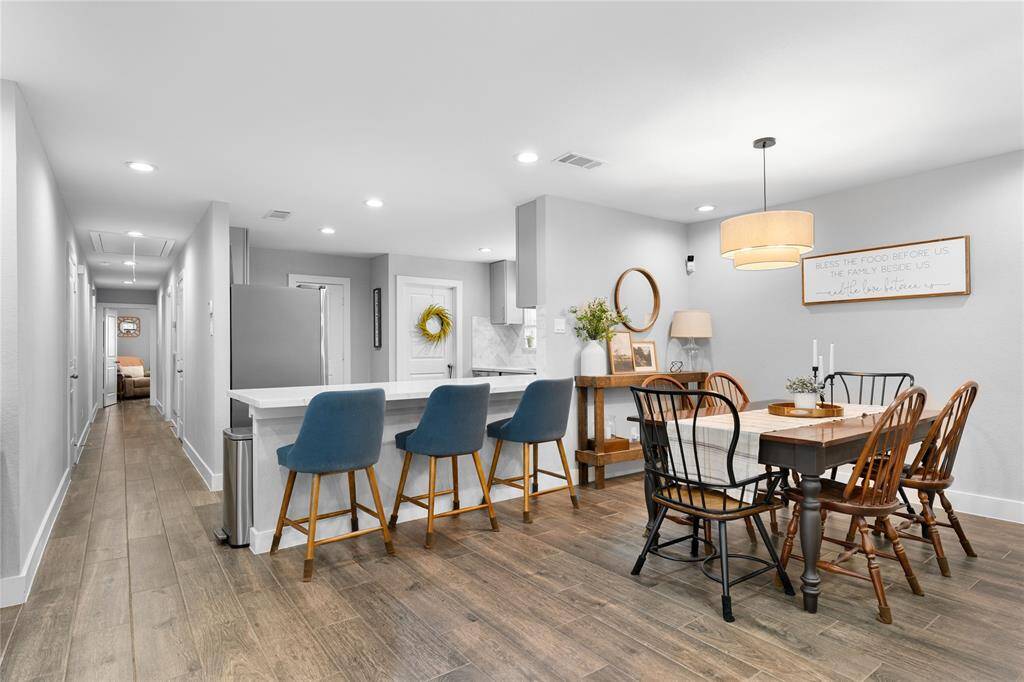 Flexible dining space and extended bar countertop.