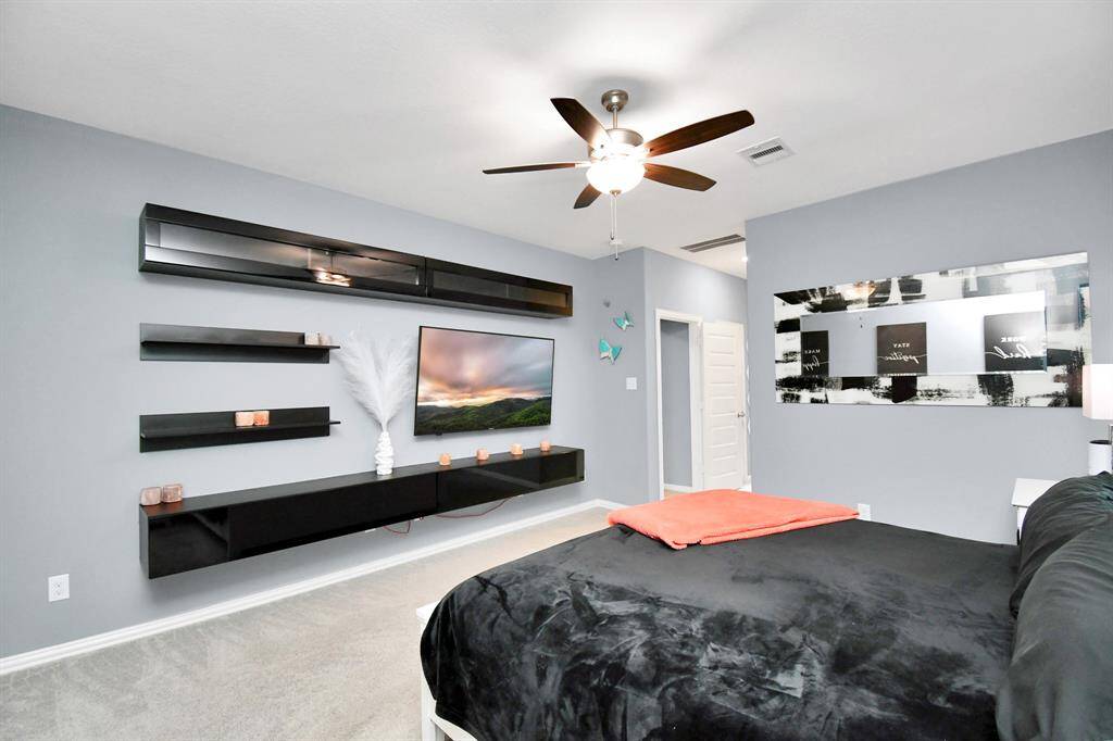 The generously sized primary suite offers the luxury of a walk-in closet and a beautifully designed ensuite bathroom!