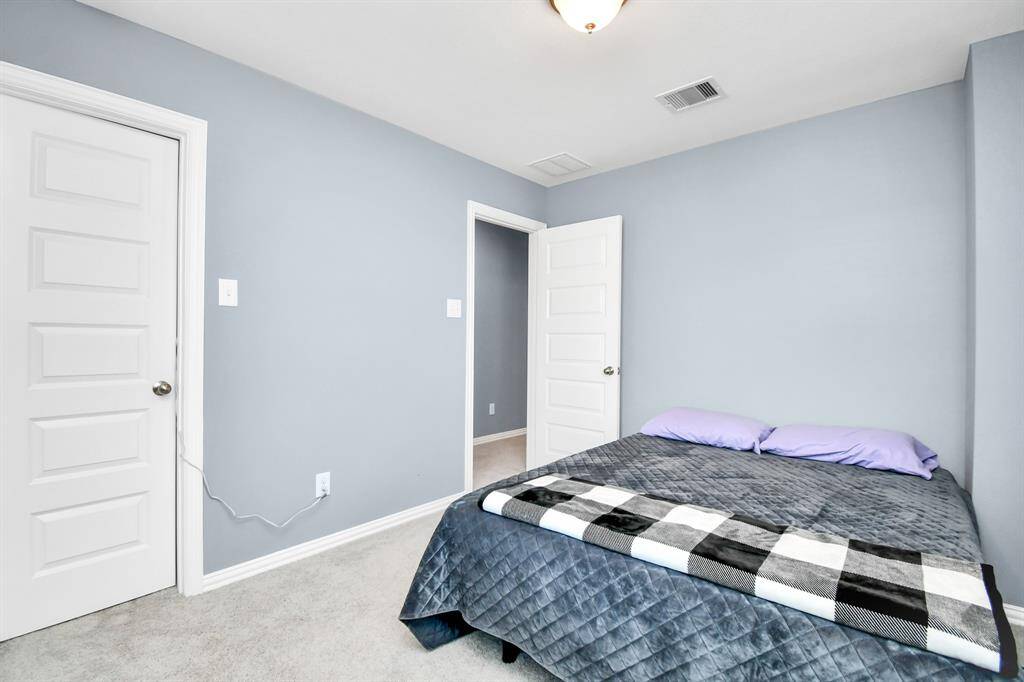 Here’s another view of the bedroom, ready and waiting for your personal touches to make it truly your own!
