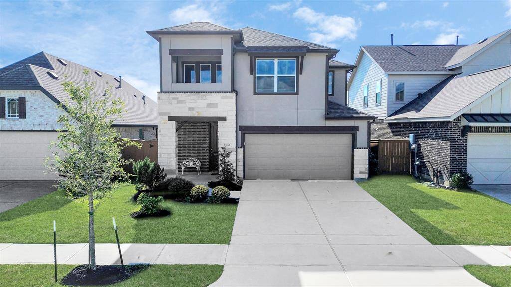 The curb appeal of this home is fantastic - with lovely landscaping and a welcoming exterior that sets the tone for the stunning home inside!