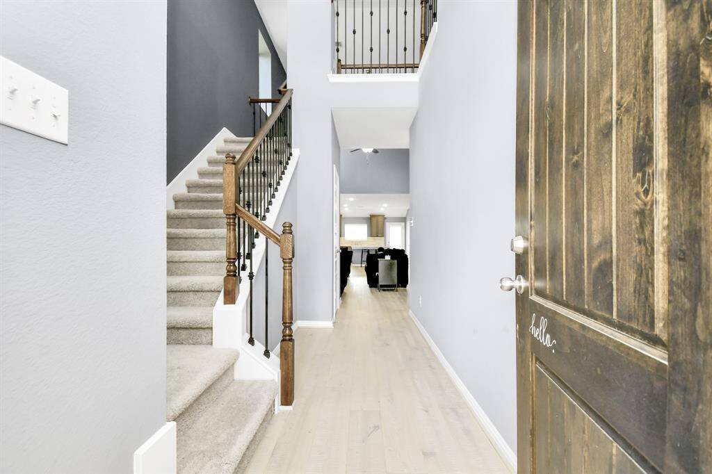 Upon entry, you're immediately struck by the spacious, airy feel created by the soaring ceilings!