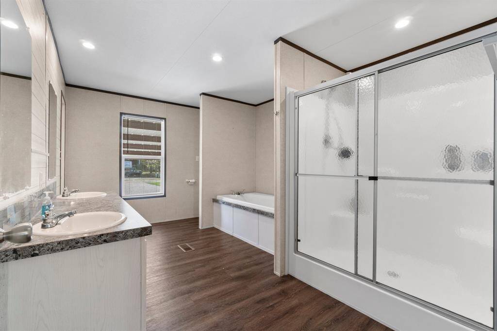 Tub with a separate shower.