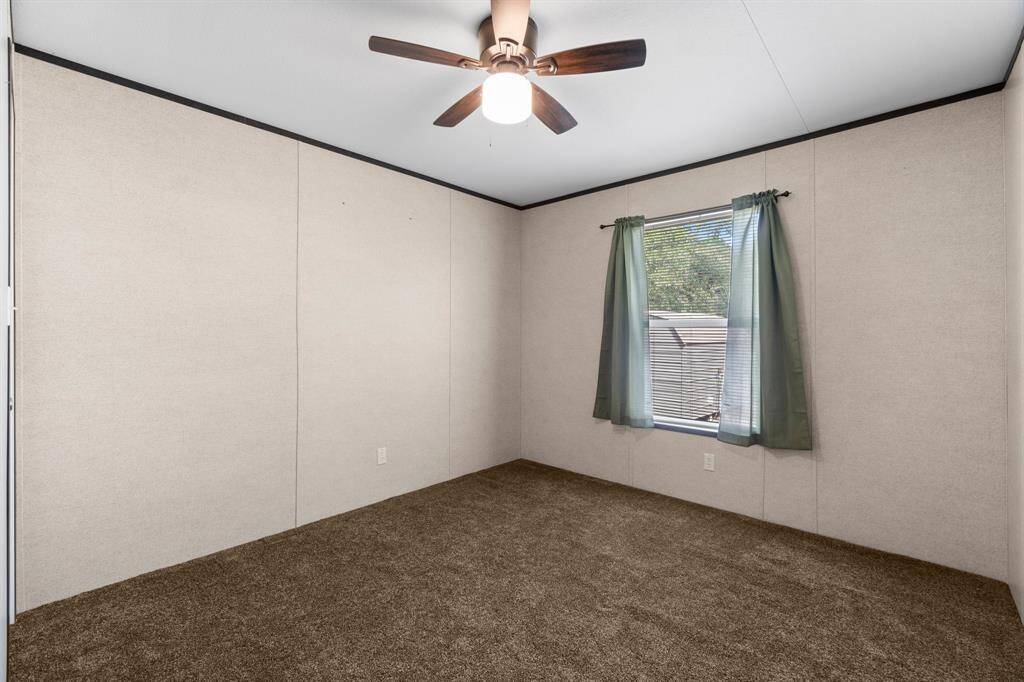 Secondary bedroom with walk in closet.