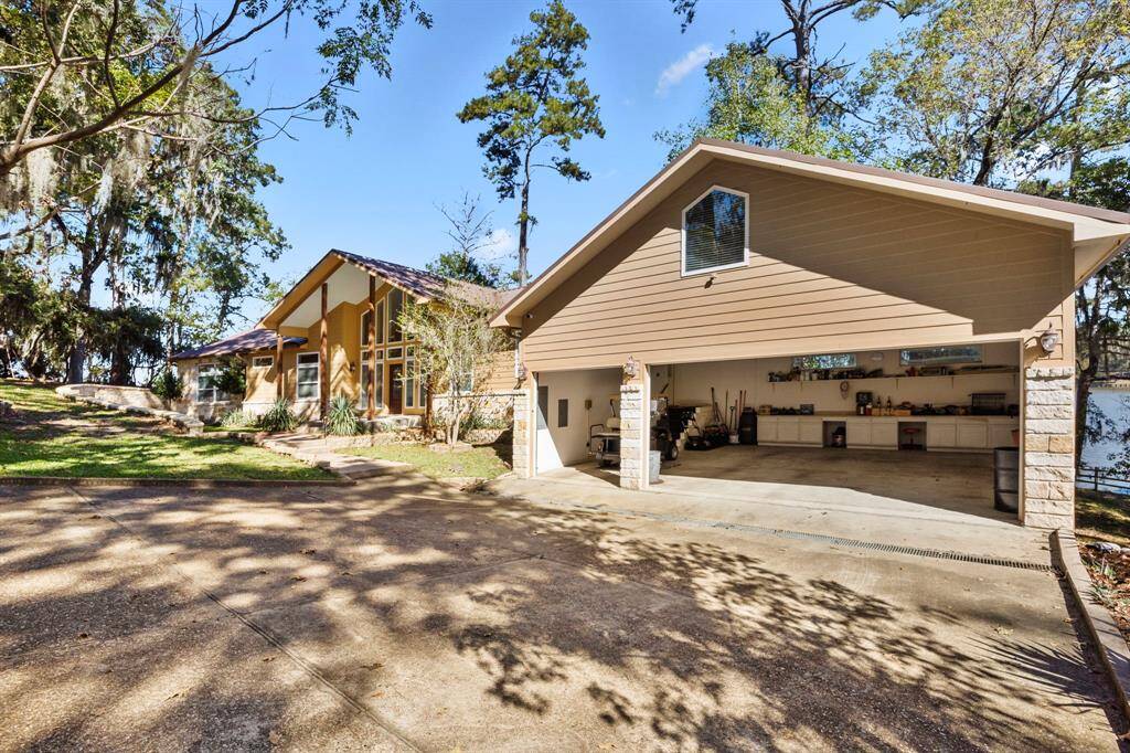 This home features a spacious 3-car garage with both width and depth, providing ample room to comfortably park two trucks, along with additional storage space for tools and equipment.