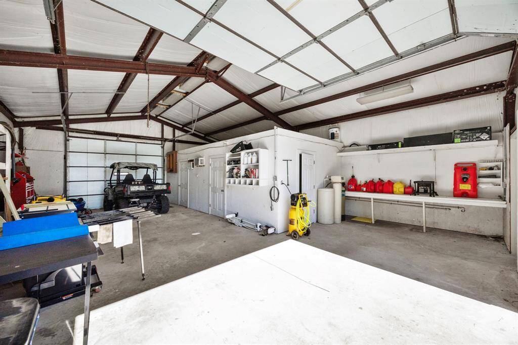 Detached Workshop.  Note - Culligan whole home water softener system in center of photo.
