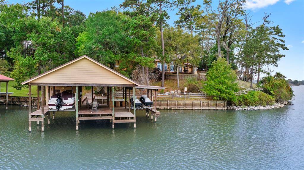 Note: second boat slip in middle of boathouse was converted to add extra floor space. The current homeowner also added upgraded lifts for both the boat and jet skis shortly after acquiring the property.