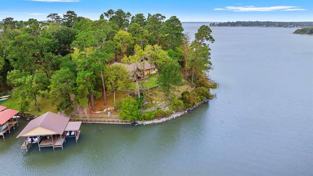 Nature lovers will delight in the local wildlife; deer, bald eagles, black bellied whistling ducks, and seasonal hummingbirds are just a few of the many animals you will see regularly.  Look across the lake for serene views of Camp Olympia, Whispering Pines Golf Course, and undeveloped woodlands, a rare and beautiful vista.