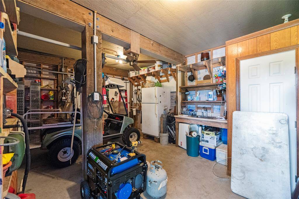 Garage and extra storage including half bath