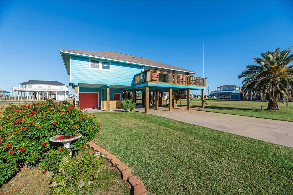 View from Verdia. Double wide driveway with abundant covered parking.