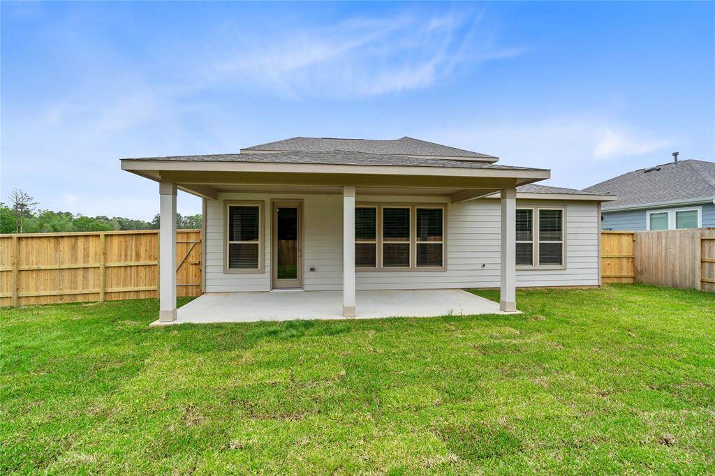 Come and see this spacious backyard. There is plenty of room for the kids to play and adults to relax!