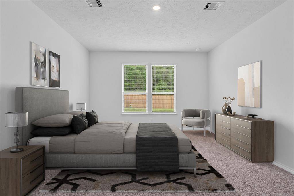 Come and unwind after a long day in this magnificent primary suite! This spacious room features plush carpet, warm paint, high ceilings and large windows with privacy blinds.