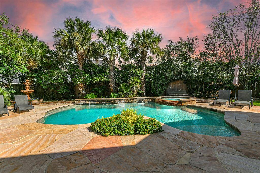 The gorgeous pool and spa with ample flagstone decking.