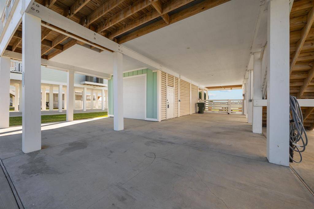 Garage storage, extra parking, and a large backyard.  This home has it all!