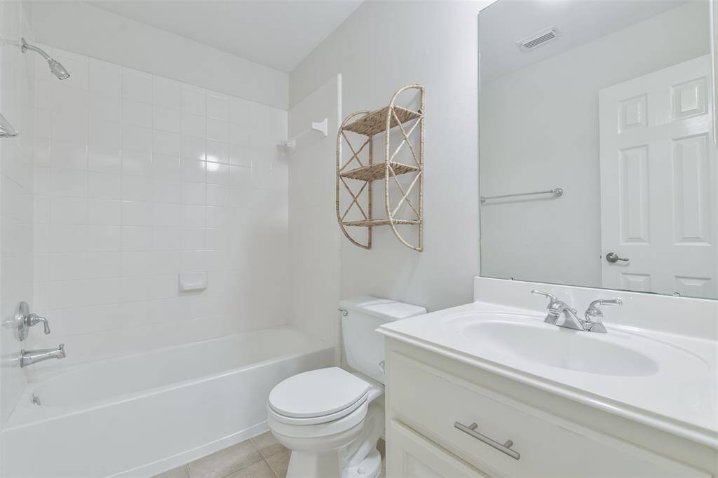 This room is the private bath of the 2nd downstairs bedroom.
