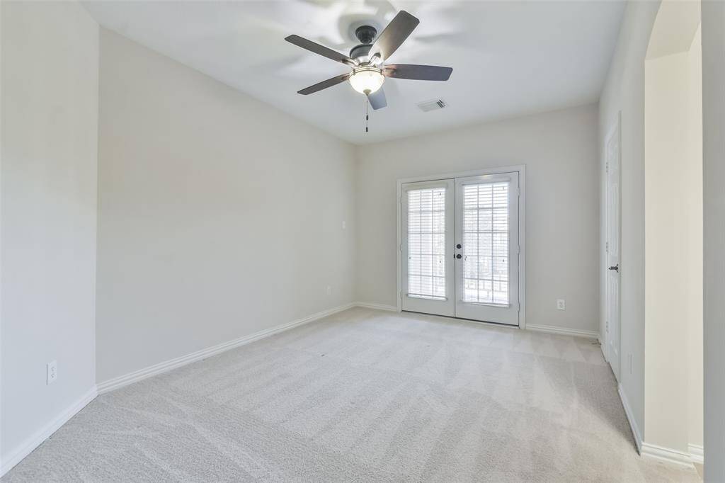 Bedroom 3 is generously sized and features carpeted floors, 2” blinds, a ceiling fan and a spacious walk-in closet.