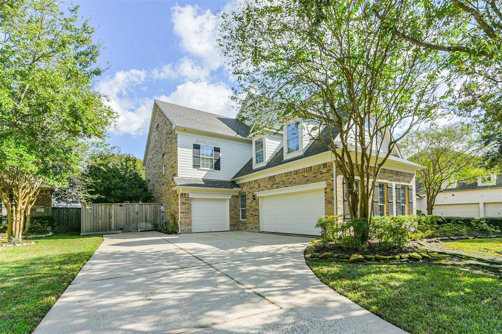 It is the exquisite Clarke floor plan and has 2 garages, one for 2 cars and one for a single car.