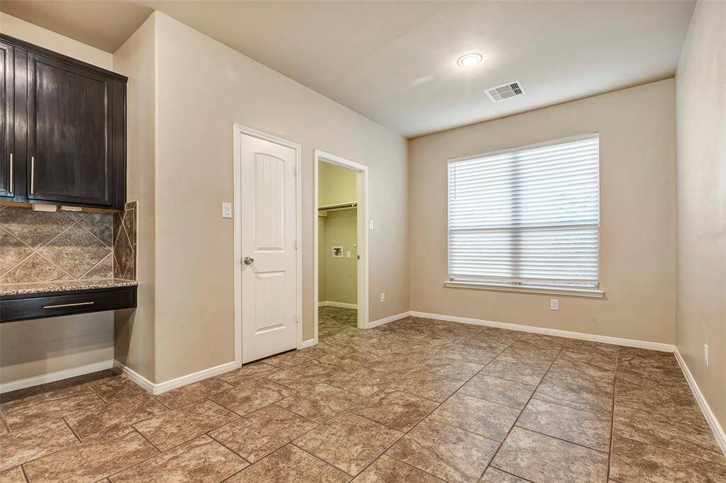 Spacious and bright breakfast area.