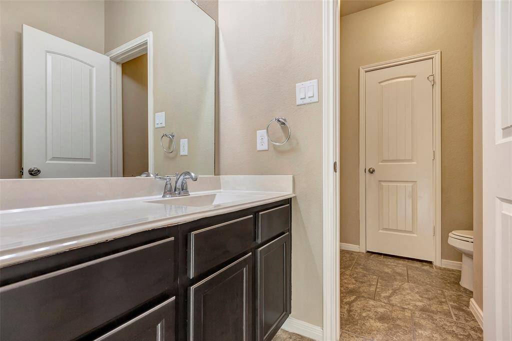 1 of the 3 full baths with cultured marble counters.