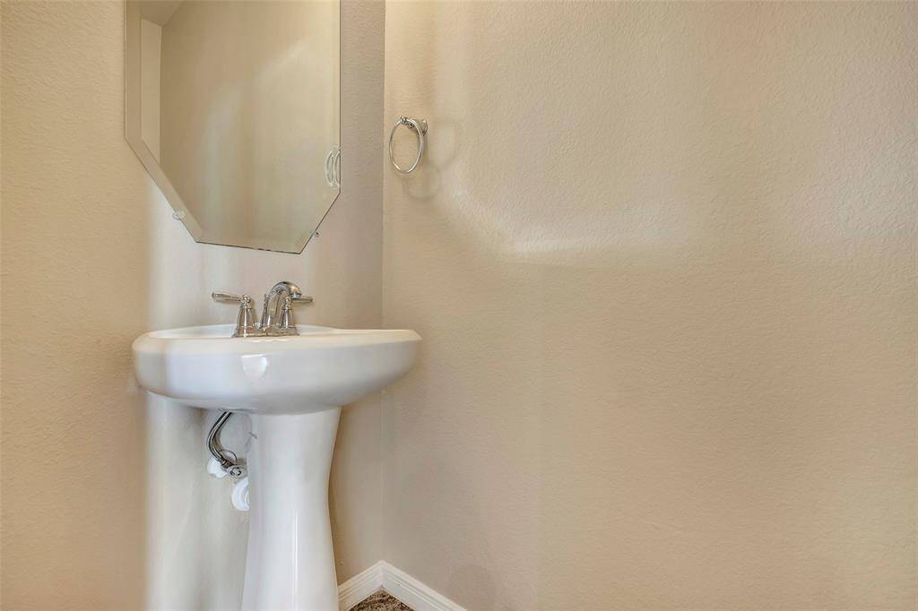 1/2 bath is conveniently located downstairs.
