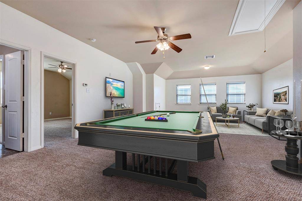 Prepare to be wowed by this upstairs setup. Absolutely huge game room or living room for the second primary bedroom set up upstairs.