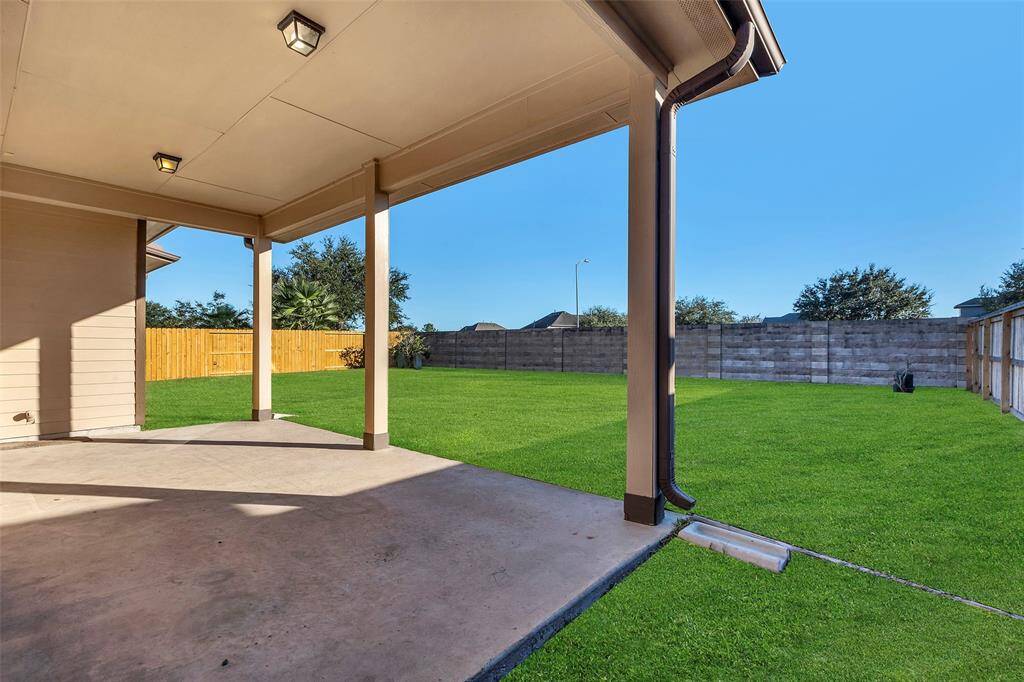Enjoy your outdoor living area year round with this cool covered patio. Great view with no back neighbors!