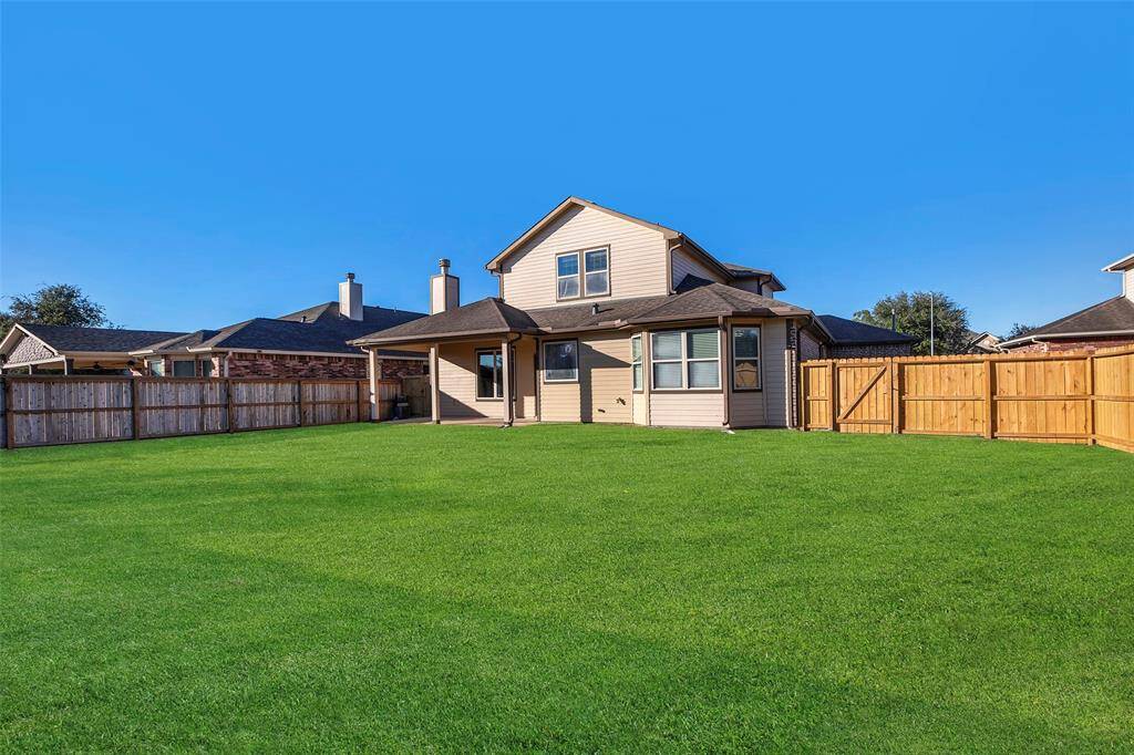 Great shot at the large yard and back of home.