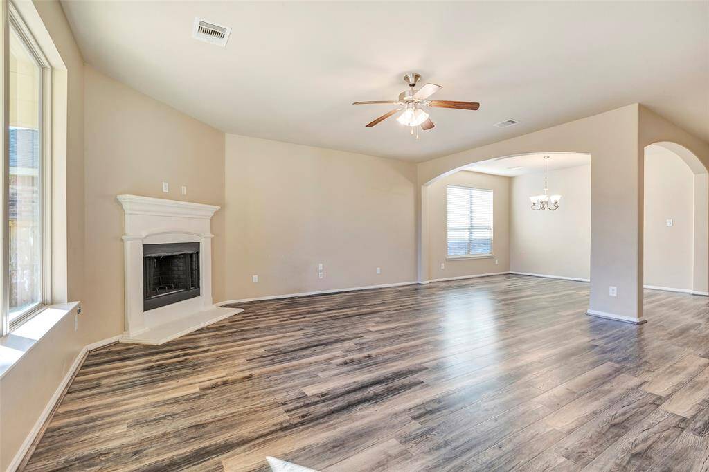 The cast stone fireplace surround fits the design perfectly.