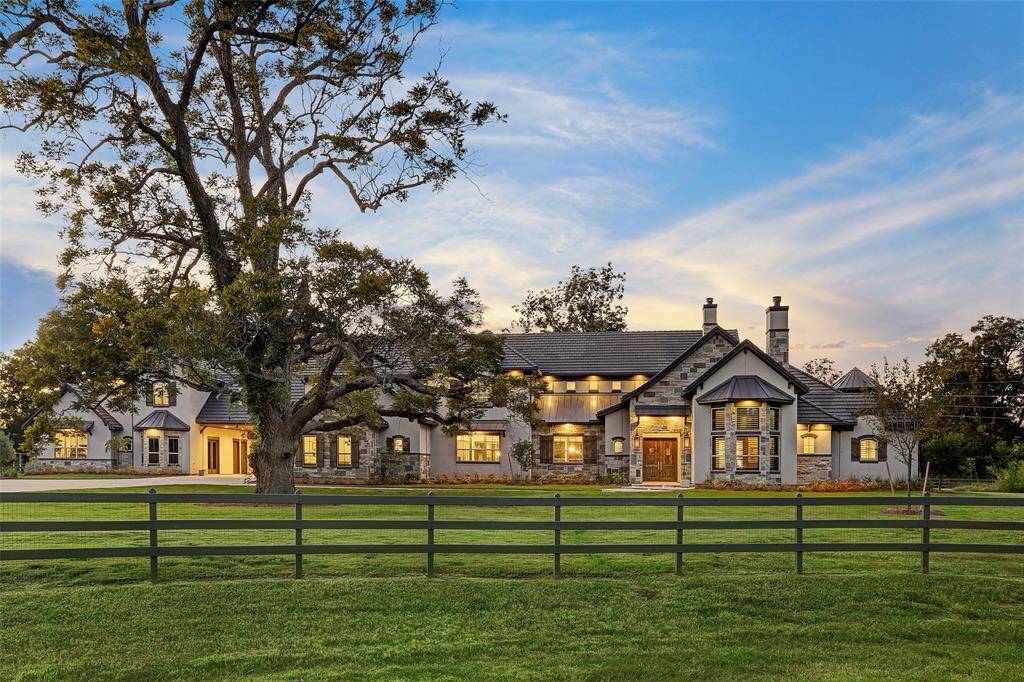 The prestigious estate at 4803 Pecan Reserve Lane in Fulbrook offers luxurious living on 2.81 acres of land.