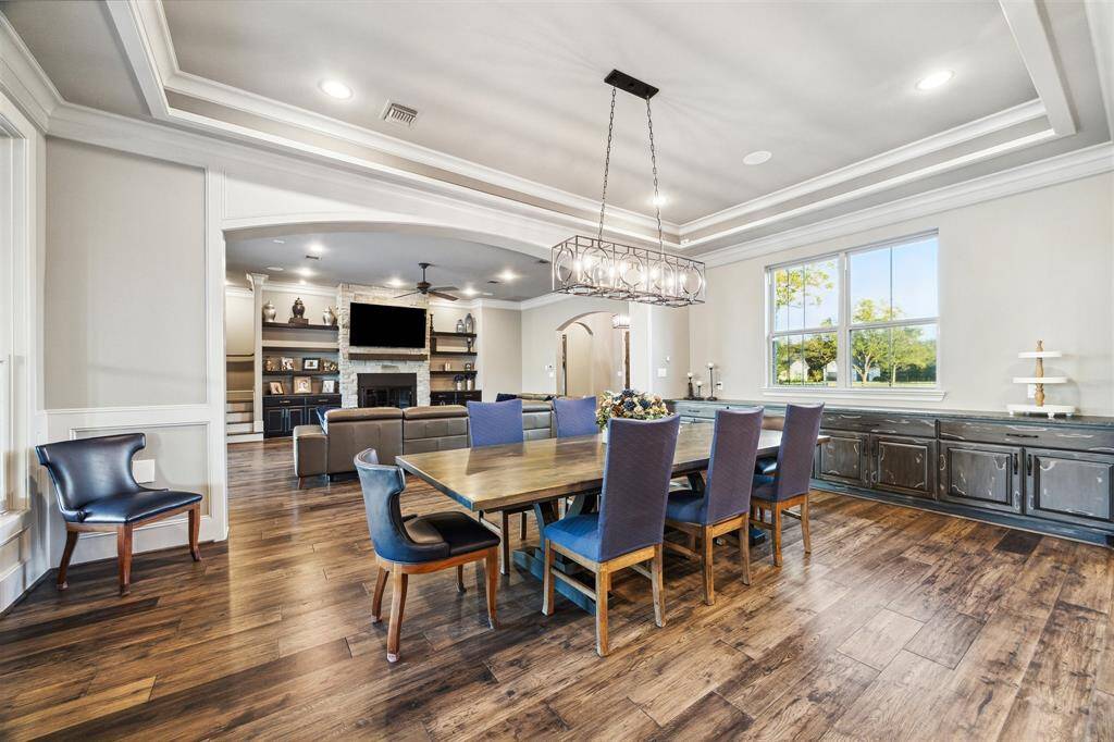 Whether you're hosting family gatherings, cozy movie nights, or simply unwinding after a long day, this family room offers a perfect blend of luxury, functionality, and tranquility.