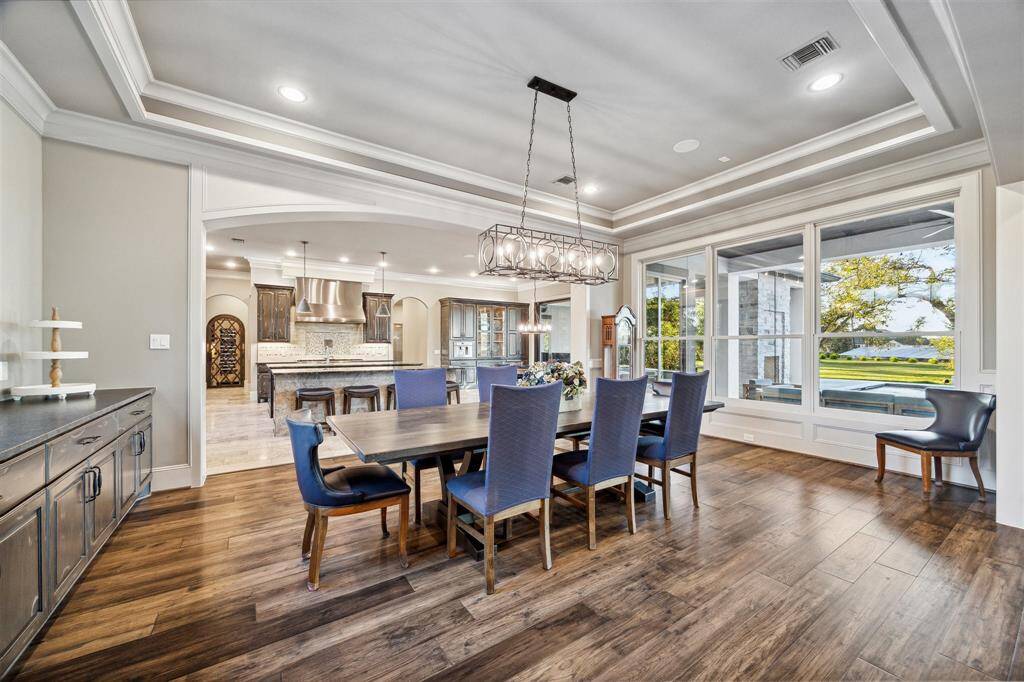 This large dining room is located between the living area and the kitchen to create the perfect flow for entertaining.