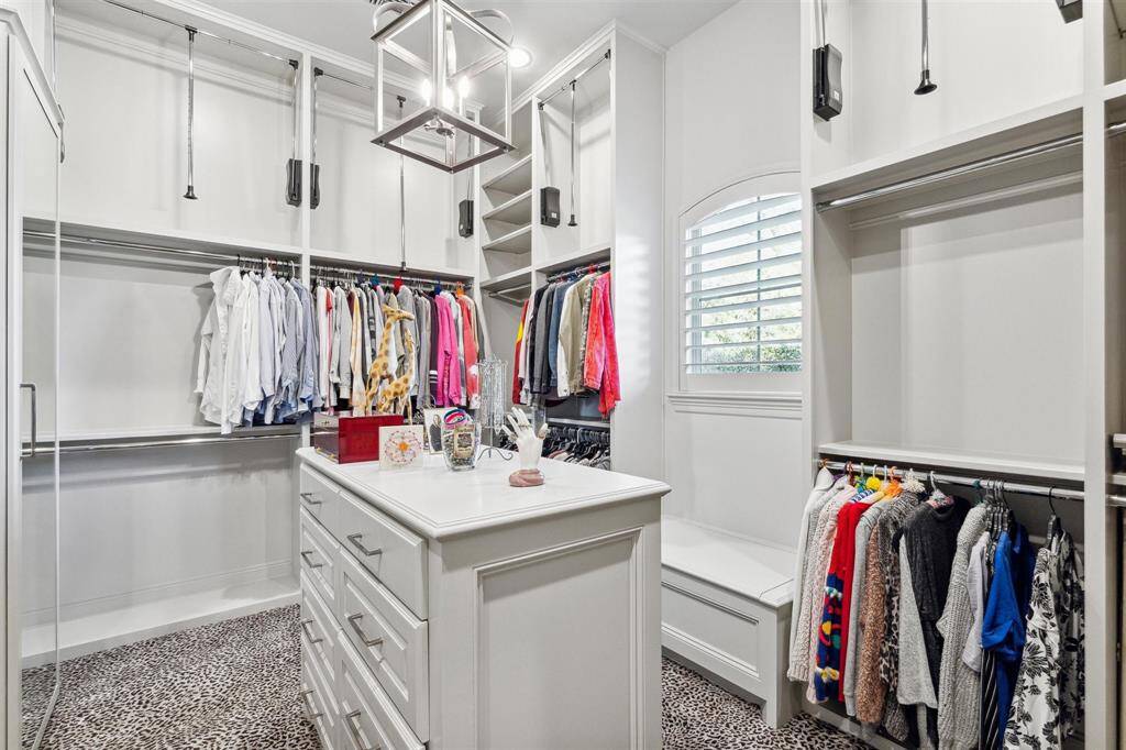 Custom closets throughout. This one leads directly to the first floor laundry room.