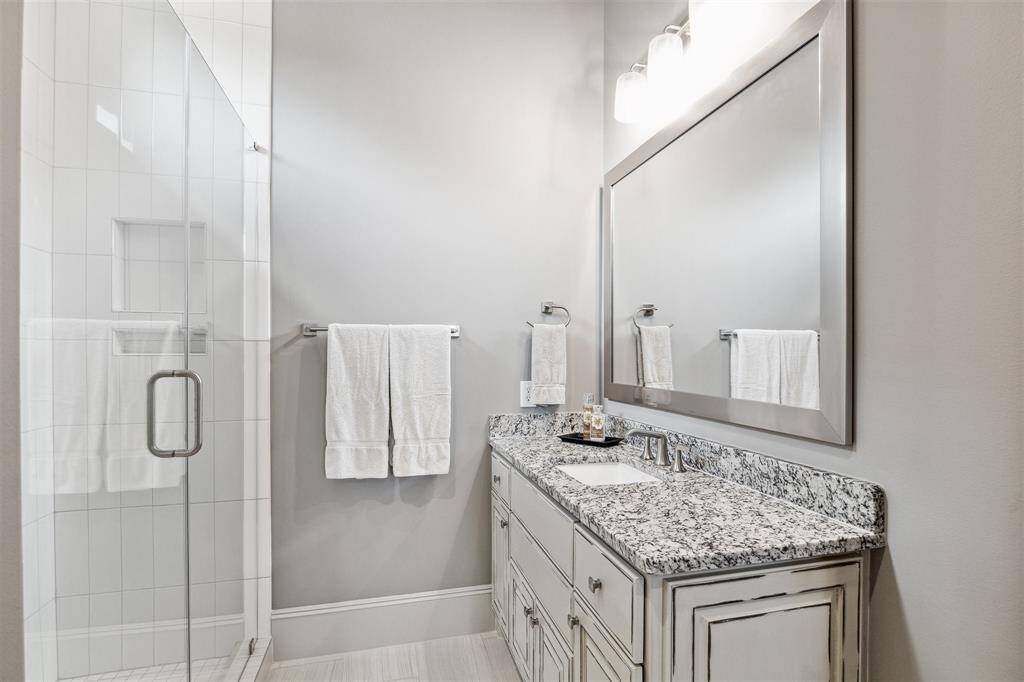 Dedicated bathroom in the first floor secondary bedroom.