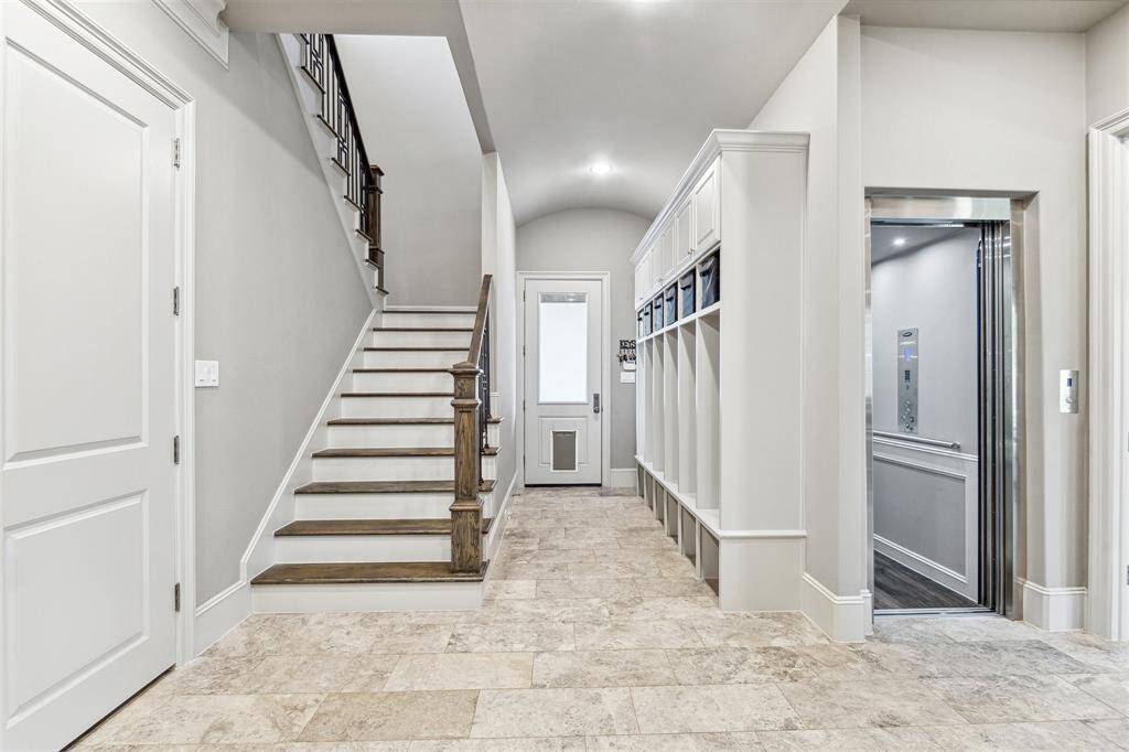 This large mudroom offers ample storage space for shoes, coats, backpacks, and everyday essentials, helping to keep your home tidy and clutter-free.For added convenience and accessibility, an elevator is also available, providing a smooth and effortless transition for residents and guests alike.