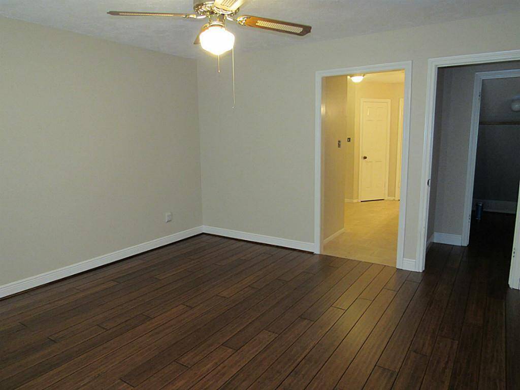 Primary bedroom wood flooring