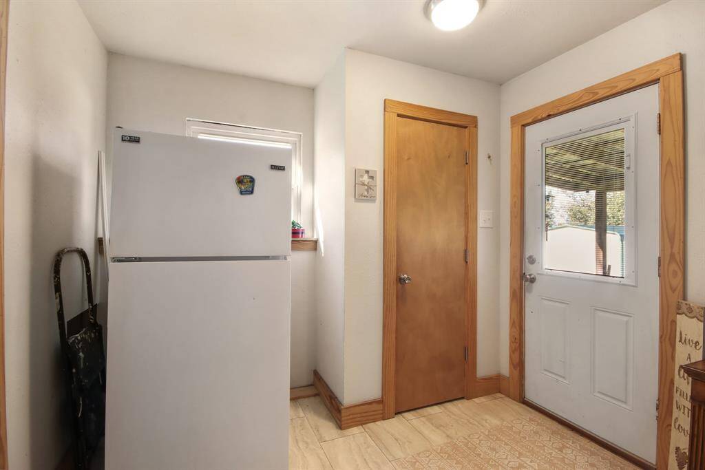 Another view of "Mud Room" and back door.