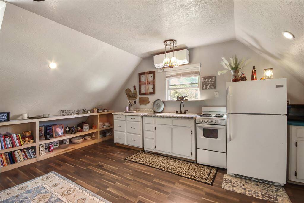 Built-in shelves in the kitchen area.