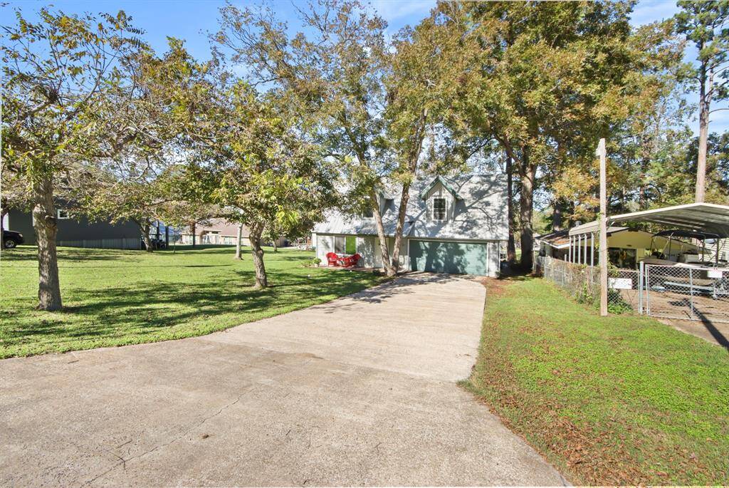 House sits on 1.5 lots. Has a large side yard.