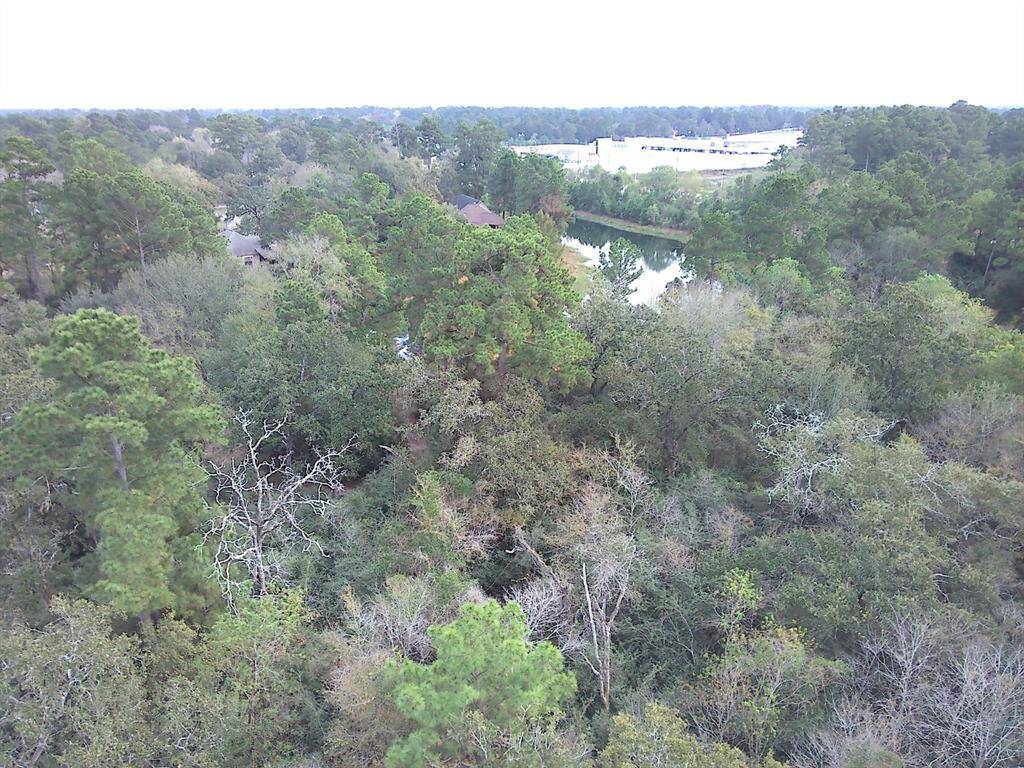 The wooded lot has a pond at the back. Great little "fishin' hole"!!