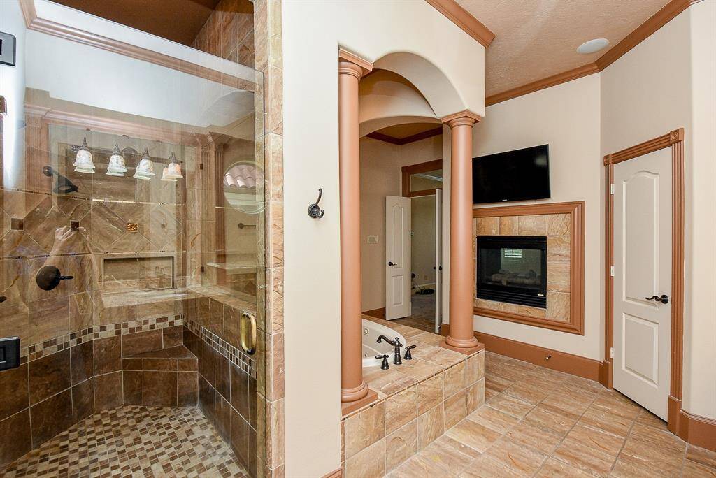 The fireplace is 2-sided and is also a major feature in the Primary Bath - relax with a bubble bath, wine and a nice fire at the end of the day.