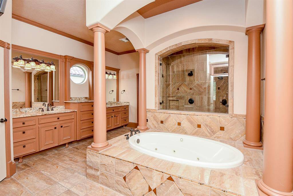 Another view of the Primary Bath!  There are double sinks and lots of counter/storage space.