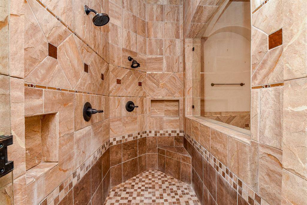 The Primary Shower is amazing with double shower heads, body jets, etc.