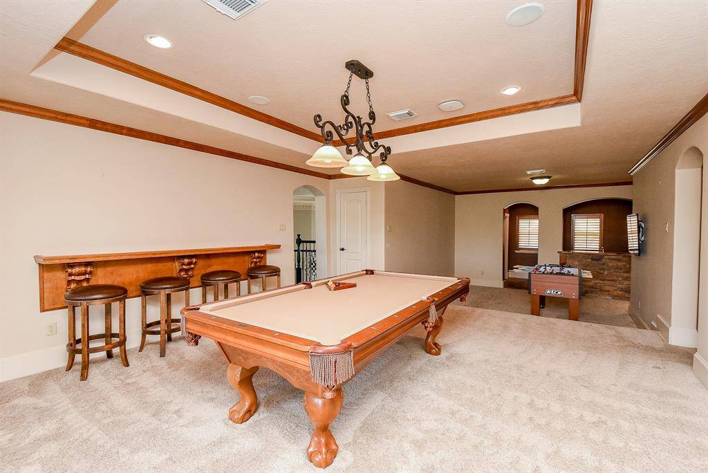 The Game Room is amazing - there are two areas - the pool table area and another smaller area for the foosball table or a card table.  There is also another full bar upstairs.