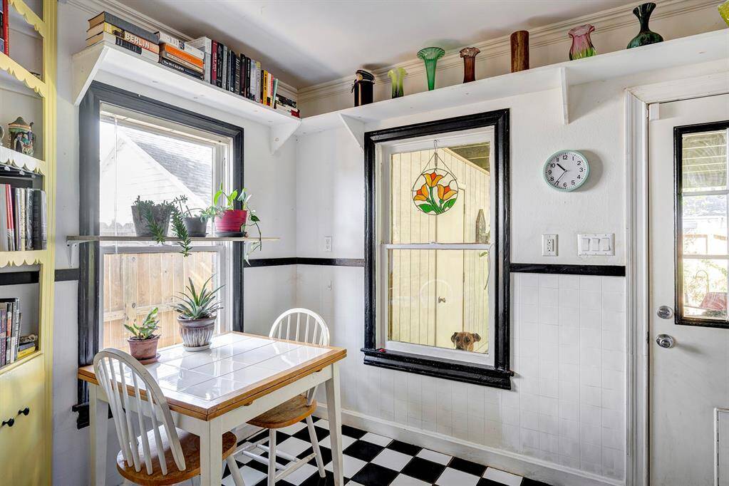 Breakfast room with views of patio and side yard