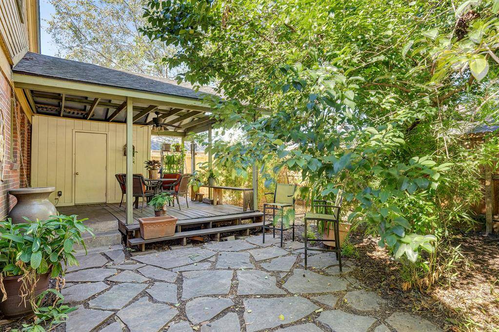 Outdoor gardens/patio area, professionally landscaped