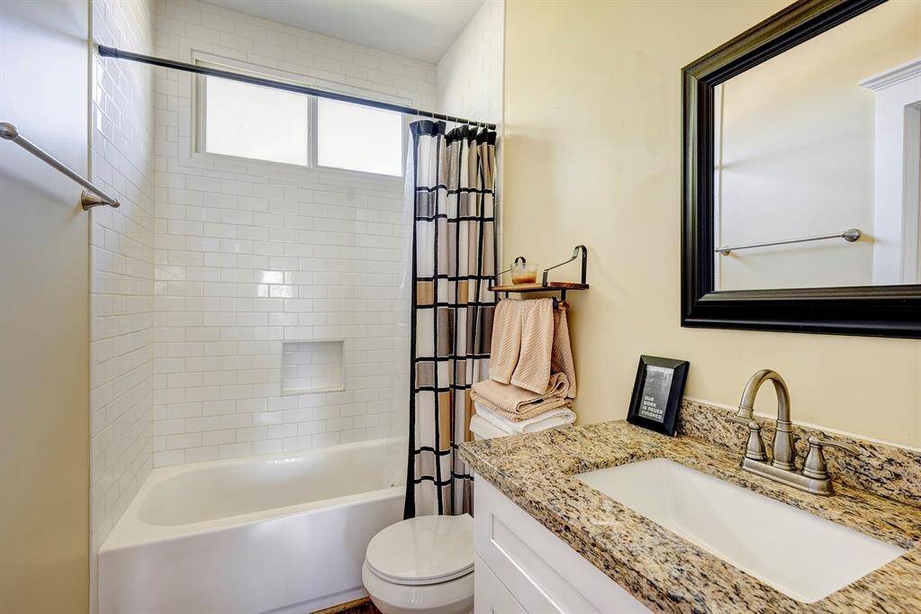 Apt bathroom, finished with designer touches touches .