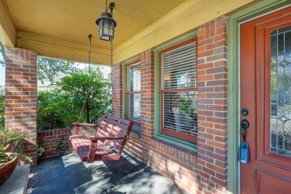 Inviting front porch with swing welcomes you